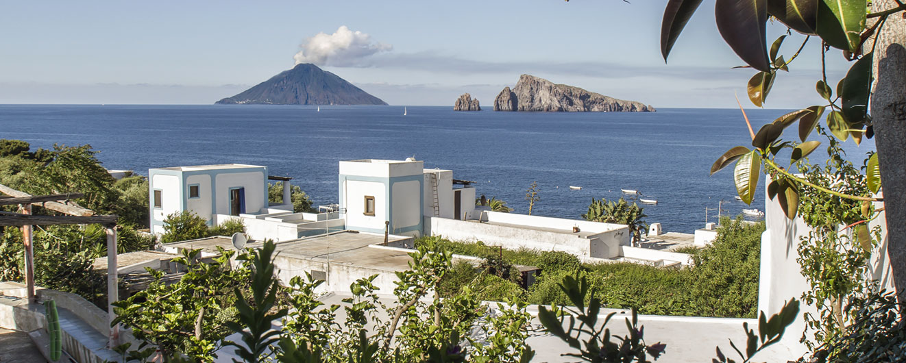 View from the island of Panarea on the steaming volcano Stromboli.